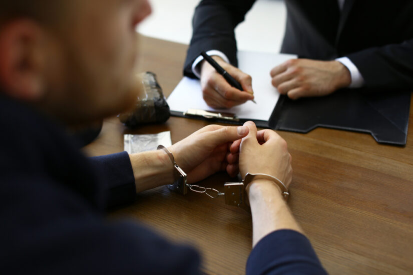 Photo of Police Officer Interrogating
