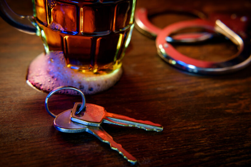 Photo of Beer with Handcuffs and Keys